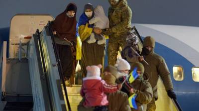 В новогоднюю ночь вернулись в Украину девять пленников из Сирии