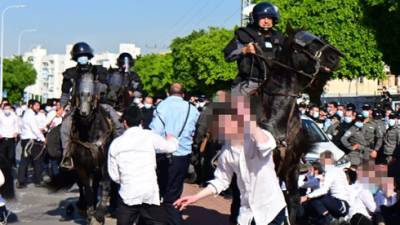 Видео: ортодоксы в Ашдоде отказались соблюдать карантин и устроили массовые беспорядки