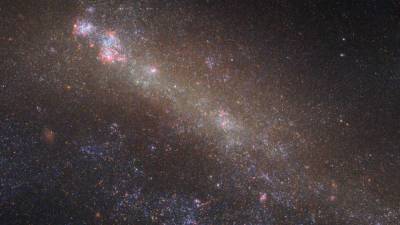 Астрономы увидели, как умирает далекая галактика