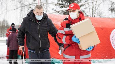 РЕПОРТАЖ: Красный Крест в морозы пришел на помощь бездомным в Минске