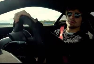 Видео: Лэнс Столл за рулём Aston Martin Vantage