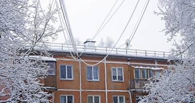 Владельцев домов в Риге будут штрафовать за снег на крышах