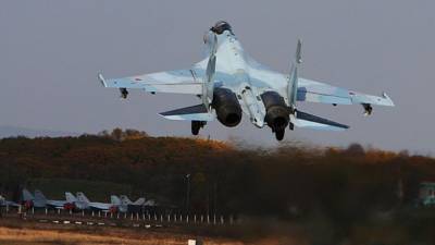 Китайские СМИ поделились подробностями встречи Су-35 с самолетом ВВС США