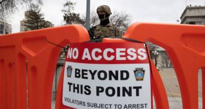 Колючая проволока, полиция и военные: как готовятся к инаугурации Байдена в городах США