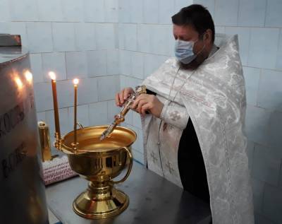 Накануне Крещения в ОАО «Молочный Мир» в Поречье освятили воду