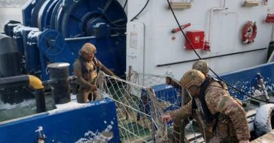В Одессе украинских моряков поймали на незаконной переправке на работу в Крым (4 фото)