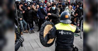 Массовые беспорядки и поджоги: что случилось в Нидерландах