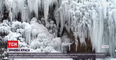 Удивительные узоры и причудливые ледяные фигуры: мороз украсил китайский город