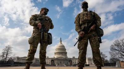 Американские власти решили оставить военных в Вашингтоне до конца марта