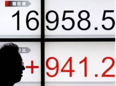 Японские акции в плюсе после повышения экономического прогноза МВФ