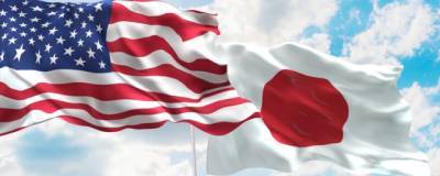 Глава японского правительства договорился с Байденом о скорейшем визите в США