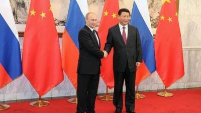 Китай выразил поддержку Путину на выступлении в "Давосе"
