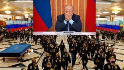 Флэшмоб в поддержку Путина исполнили «люди в черном», что весьма характерно для нынешней власти