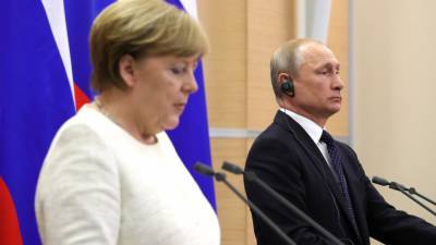 Путин и Меркель обсудили производство вакцин от коронавируса