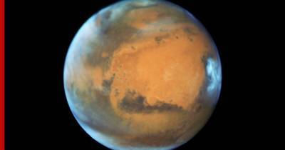 Ученые показали новые фото самого загадочного каньона Марса