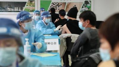 Власти Китая использовали более 9 млн доз вакцины от COVID-19