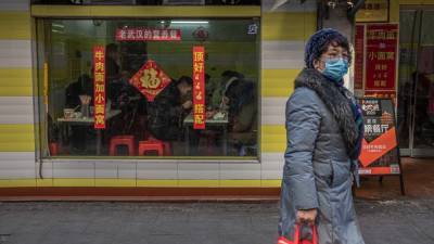 Жителей двух городов Китая попросили 7 дней оставаться дома из-за COVID-19