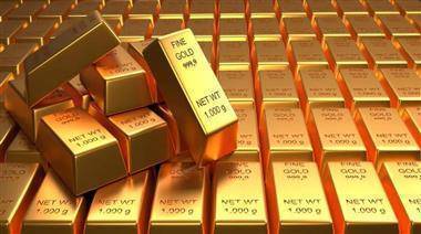 Золото слабо дорожает на возвращении спроса на активы-"убежища"