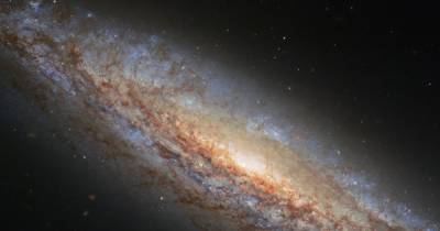 Суперветер и новые звезды. Хаббл сделал снимок далекой галактики с удивительными процессами