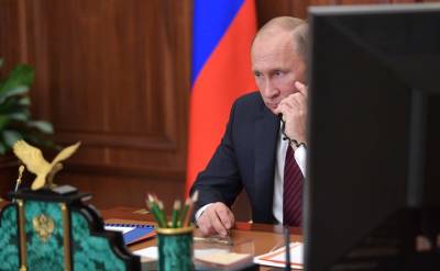 Путин обсудил ситуацию в Донбассе по телефону с Макроном и Меркель