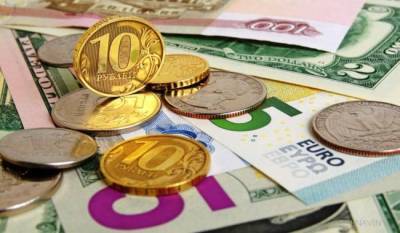 Курсы доллара и евро к рублю упали до минимума за год