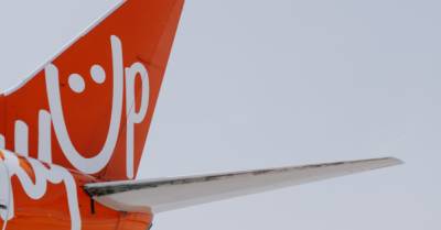 SkyUp задержала вылет на 4 часа, пытаясь усадить пассажирку с Covid-19 в забитый самолет