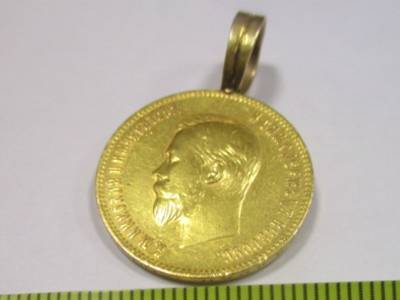 Старинные монеты обнаружили таможенники в ручной клади пассажиров Платова