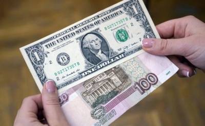 Эксперт: Если внешний фон ухудшится, пара доллар-рубль вновь уйдет выше отметки 71