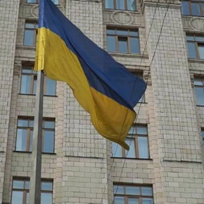 В Киеве прошла акция в стиле "Игры в кальмара" против поднятия тарифов на ЖКХ