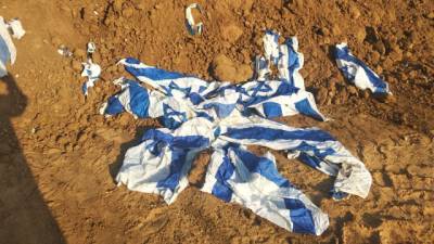 Мэрия Нетании закопала израильские флаги, а теперь их вывезут на свалку