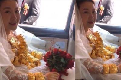 Курьез: в Китае девушка надела на свадьбу 60 килограммов золота и не смогла ходить