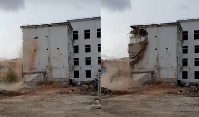 В Тюмени главное здание ТюмГУ сносят с помощь строп