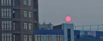 Астроном Евгений Вереин: Необычный цвет солнца в небе над Астраханью вызван пожаром