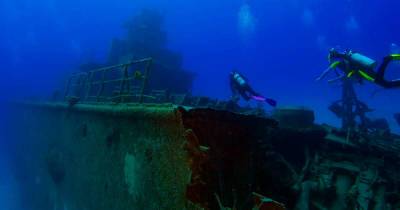 Гигант под водой: как хоронят подлодки и поднимают затонувшие корабли