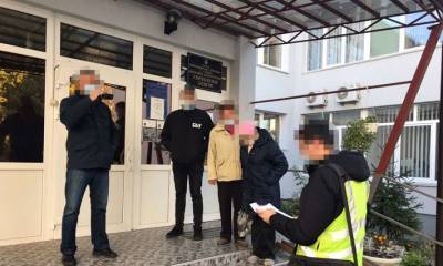 В Киеве проходят обыски в Святошинской РГА
