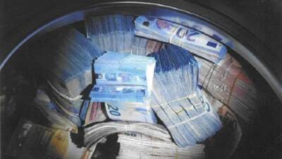 Мужчина спрятал €350 тыс. в стиральной машине
