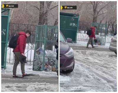 Житель Новосибирска прошёлся по слякоти в городе в ластах