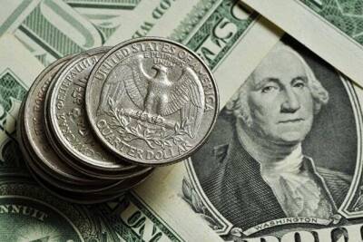 Доллар коррекционно дешевеет к евро и иене