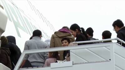 Домой из Белоруссии отправляется первая группа иракских беженцев
