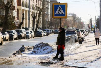 Подрядчики в Новосибирске за свой счёт отремонтируют уложенный в снег асфальт