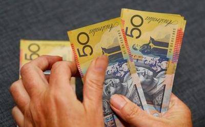 Австралийский доллар снижается после заседания ЦБ; ФРС в центре внимания