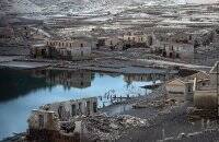 Город-призрак, затопленный в Испании 30 лет назад, восстал из глубин. Фото