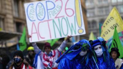 COP26: активисты протестуют против "гринвошинга" крупных корпораций