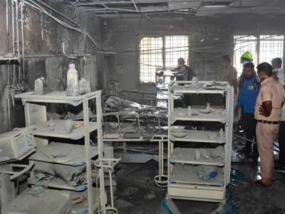 По меньшей мере 11 человек погибли в результате пожара в палате COVID индийской больницы