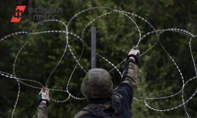Мигранты штурмуют ограждения на польской границе