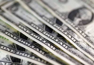 Средний курс доллара США со сроком расчетов "завтра" по итогам торгов составил 74,6168 руб.