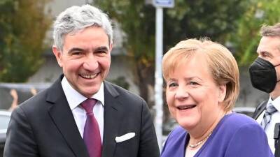 Опасная дружба для немецкой демократии? Как Меркель продвигала свои законы