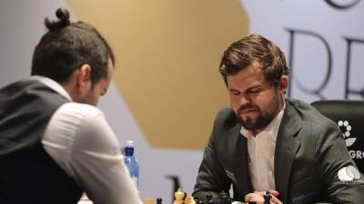 Непомнящий и Карлсен в пятый раз подряд сыграли вничью в матче за шахматную корону