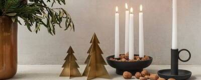 В новогодние праздники нужно украсить дом свечами