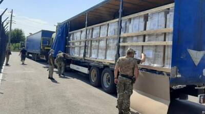 В ОРДЛО за неделю прибыло около 20 грузовиков с гумпомощью от МККК